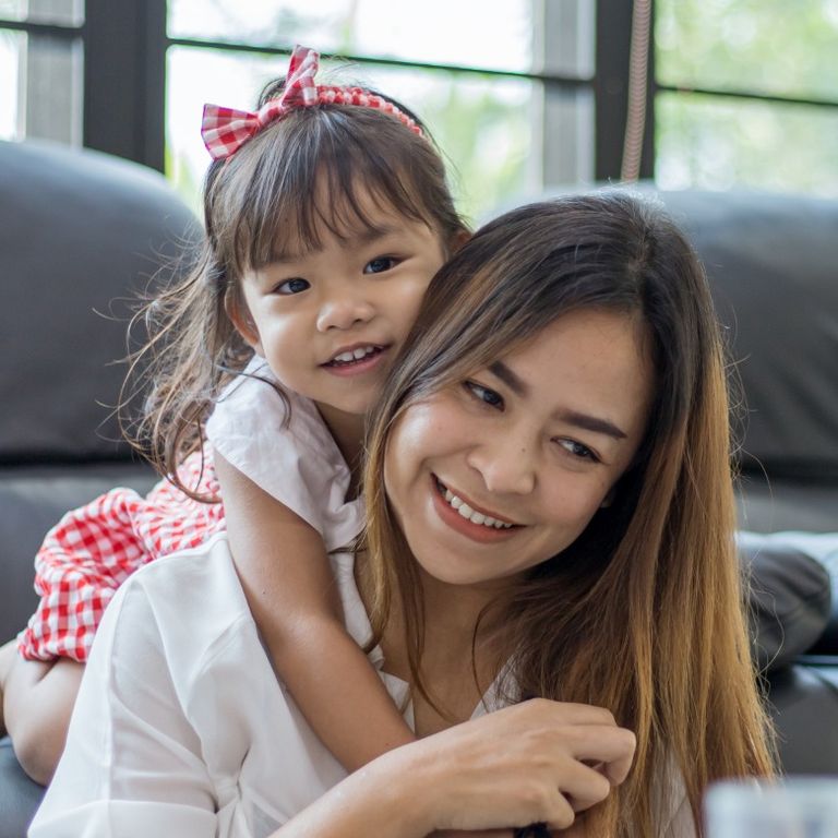 Photo d'une mère avec un enfant